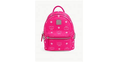 If you are looking for the specific color values of neon pink, you will find them on this page. MCM Stark Backpack Neon Pink in Pink - Lyst