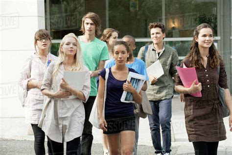 University Students Walking On Campus Stock Photo Dissolve