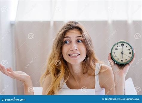 Shocked Young Woman Waking Up With Alarm Stock Photo Image Of Room