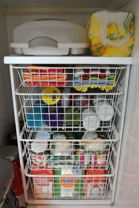 Make use of the narrow space between the shelves and pantry door by screwing. Organizing a Pantry with Deep Shelves for Everyday Use