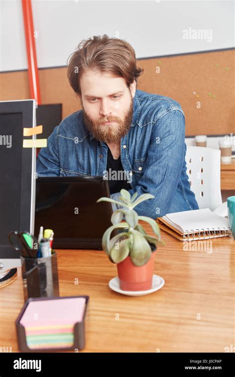Nerd Programmer Working With Laptop Computer In Office Stock Photo Alamy