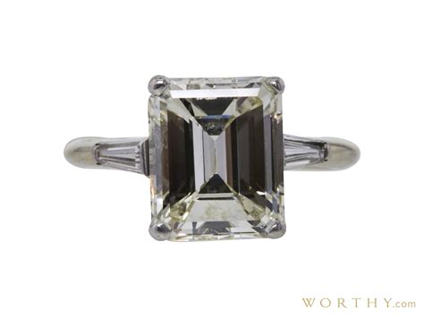 4-30-ct-emerald-cut-3-stone-ring-sold-for-$16,000-worthy-com