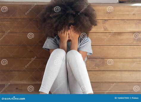 Sad Biracial Small Girl Sit On Floor Crying Stock Photo Image Of