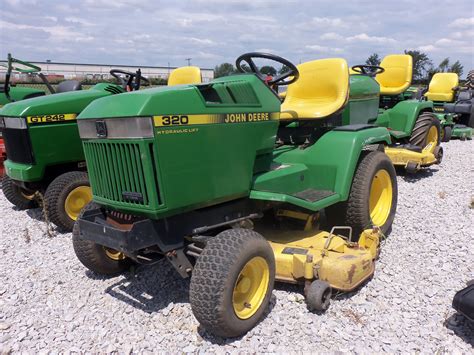 The dealer swapped out the 48 deck with a 42 deck from a x300 so that it would fit in our building. John Deere 320 lawn & garden tractor | John Deere ...
