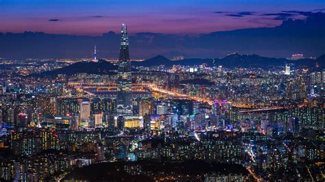 Seoul City At Night Time Lapse Aerial View And Buildings With Downtown