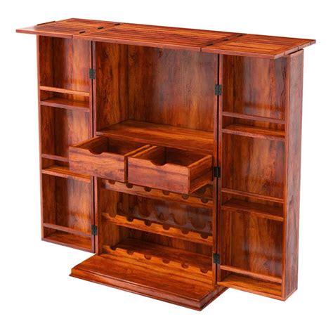 The two drawers keep the entire bar accessories at hand while the one door storage cabinet is perfect to store other liquor bottles. Wisconsin Rustic Solid Wood Expandable Bar Cabinet with ...