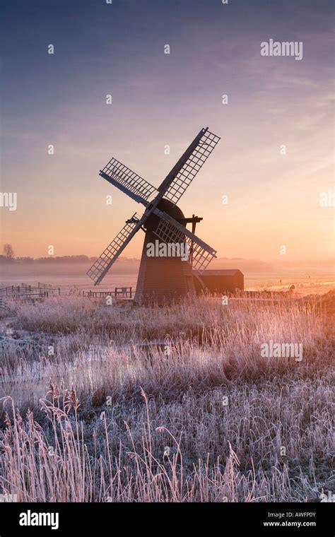 Cold Hoar Frosted Sunrise At Herringfleet Windmill On The Norfolk
