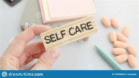 Words Printed On Wooden Blocks Self Treatment Concept Blue Background