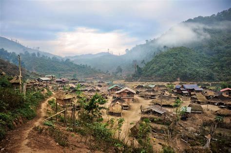 a rural village in laos taken while trekking in the luang nam tha region laos village