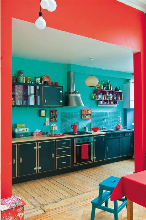In a typical kitchen, cabinets and appliances leave little room for kitchen wall decor ideas. To Tame Me | Red kitchen decor, Teal kitchen decor, Red kitchen walls