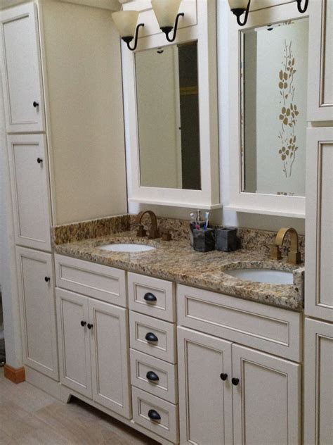 For others, it's a place to reset their day. Woodpro vanity in Biscuit with Delta 'Vero' faucets in ...