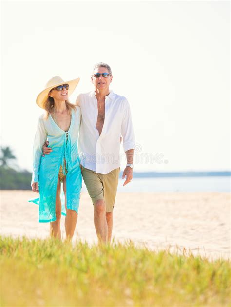 Romantic Couple Walking On The Beach Stock Photo Image Of Love