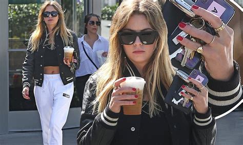 Ashley Benson Sports Gold Band On Ring Finger While Grabbing Coffee In LA
