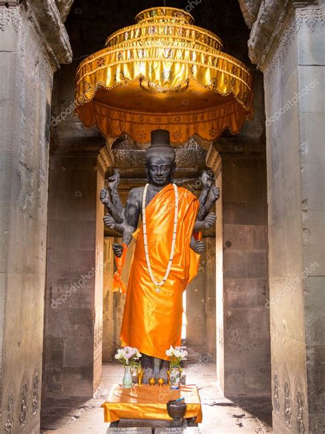 Written inscriptions of the temple's history, if they ever existed, have. Ancient Vishnu Hindu God Statue in Angkor Wat, Cambodia ...