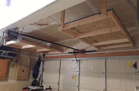 You can adjust the width of the storage unit to the nearest joist. Above Garage Door Storage Project DIY - Finished | Garage ...