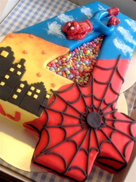 Piece of festive chocolate cake and cherry. Number 4 Spiderman Birthday Cake - only this year will be ...