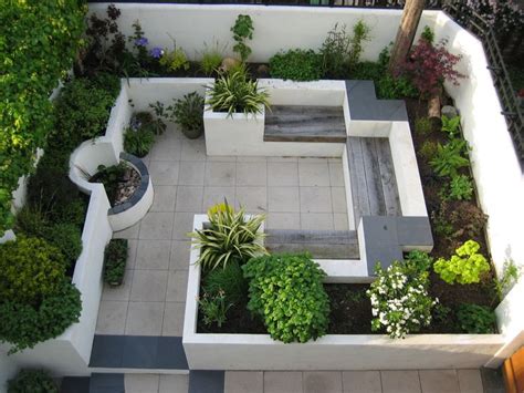 The trick is to go for as many different types and heights of garden as possible: This modern courtyard garden makes good use of a small ...