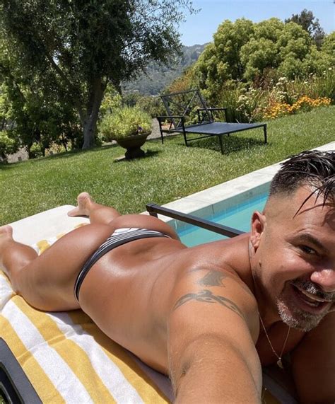Sexy Gay Man Tanning Outside In Thong Corey716