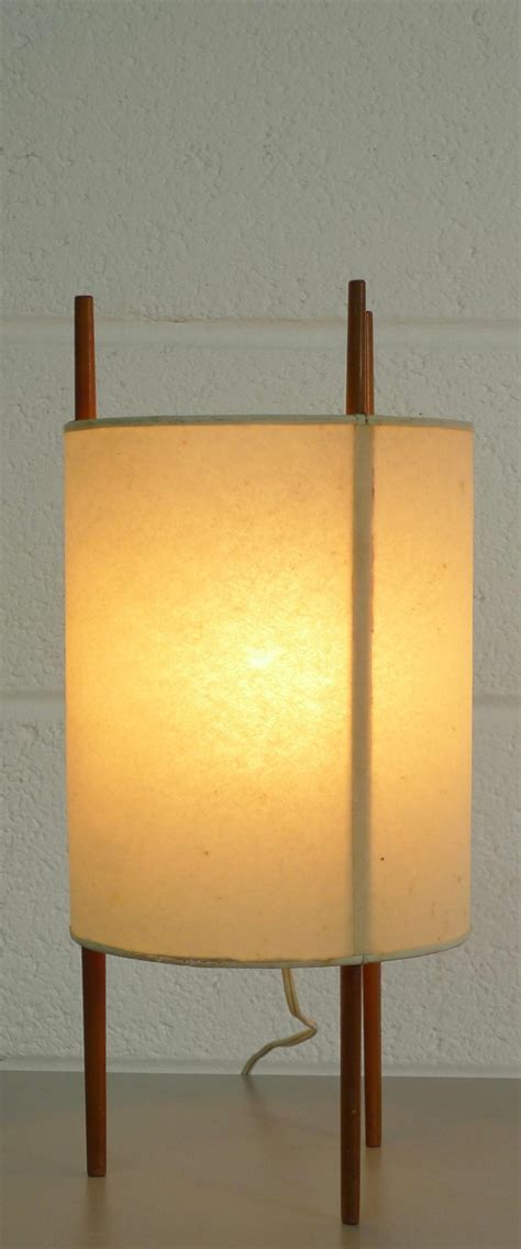 Noguchi designed the first of his lamps that would be produced by the traditional gifu methods of construction. Isamu Noguchi for Knoll International, USA, Model 9 Cylinder Table Lamp For Sale at 1stdibs