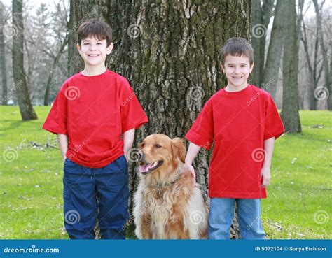 Children With Golden Retriever Stock Photo Image Of Boys Animals