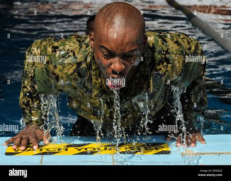 Navy Hospital Corpsman 2nd Class Rolando Brooks Pushes Himself Out Of
