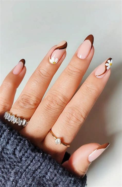 32 Prettiest Autumn 2022 Nail Trends To Try Now Brown Swirl Almond Nails