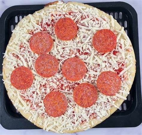 The air fryer doesn't take as long to preheat as a conventional oven would, saving precious minutes, and the cooking time is. How Long To Cook A Frozen Pizza In A Ninja Foodie Air ...
