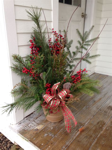 Visitors can wipe their feet and keep. Porch pot | christmas decor | Pinterest