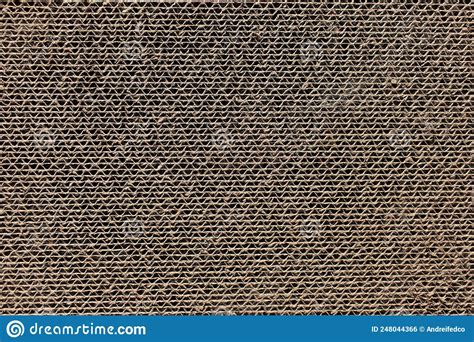 Abstract Textured Background Of Corrugated Cardboard Of Beige Color