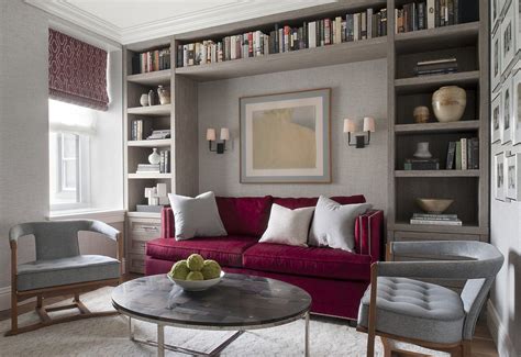 Wooden beams and decorative pieces can add texture and play up a living room's rustic flair. Custom millwork mixes with a velvet sofa in a bold ...