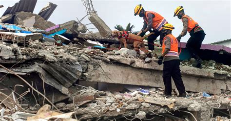 Indonesia Quake Toll Hits 56 As Rescuers Race To Seek Out Survivors