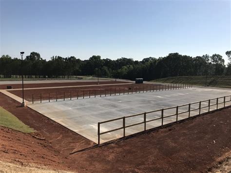 Once the concrete arrives on site, our crews pour and finish concrete pavement, sidewalks, curb and gutter, structures, or anything else the project requires. Huntsville Police Department Firing Range Concrete - Dunn ...