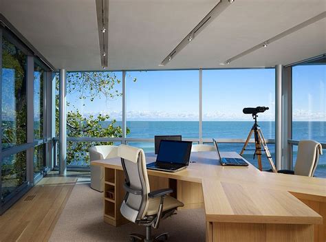 Home office room tours make interior design inspiration and follow through almost if neutrals help you focus, go for a black marble or smoked glass office desk that complements a back and white area rug. 12 Remarkable Home Offices with an Ocean View | Modern ...