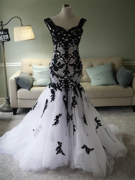 There was a time in fashion when almost every bridal and bridesmaid wore extravagant wedding dresses adorned with lace, beading, embroidery, ruffles, and many simpler to extravagant details with no cheap looking. Black And White Wedding Dress by Brides & Tailor | Brides ...