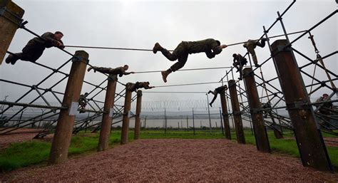 Us Marines Tackle The Bottom Field At Commando Training Centre Royal