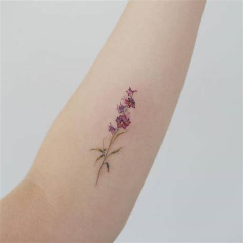 30 Delicate Forearm Flower Tattoo Designs And Ideas