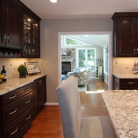 Moon white granite with white cabinets, a white subway tile backsplash, and stainless steel appliances. White Spring Granite Ideas, Pictures, Remodel and Decor ...