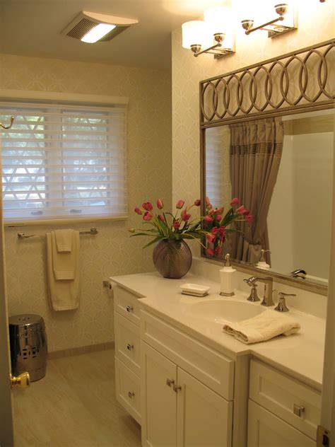This orange county, california, bathroom was stuck in the 1980s, with a cramped layout and a lack of light. 1980's Bathroom Remodel - Lenore Frances Interiors