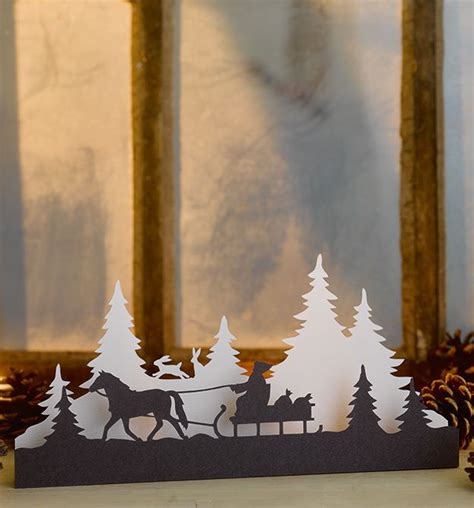 Winterliche Papierszenen Scherenschnitt Weihnachtenwinterkrippe