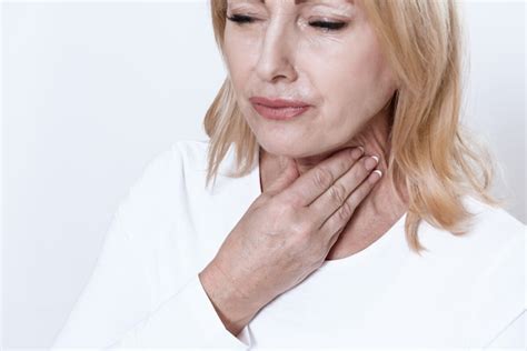 Premium Photo A Woman Has A Sore Throat She Has No Voice