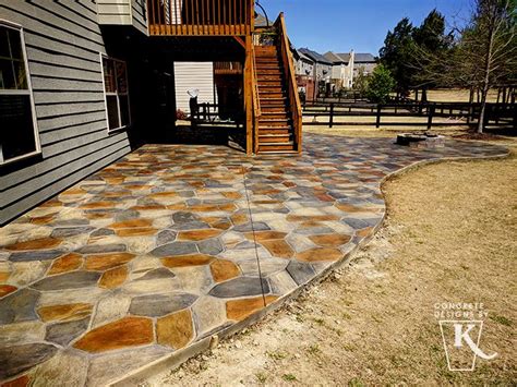 Stamped concrete can add a unique look to your patio. Keystone Concrete stamped and hand stained flagstone ...