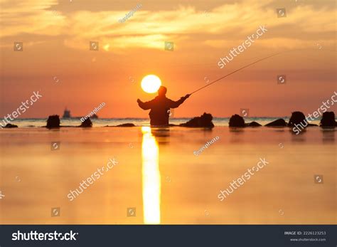 Rear View Silhouette Man Fishing Rod Stock Photo 2226123253 Shutterstock