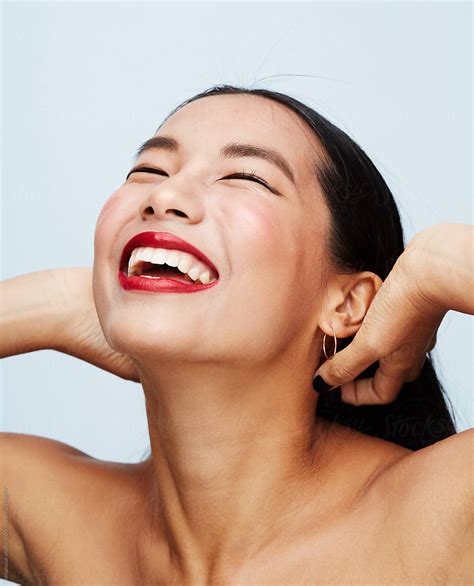 Happy Woman Portrait With Red Lips Del Colaborador De Stocksy