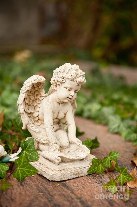 Small Angel Statue Kneel Photograph By Arletta Cwalina Fine Art America