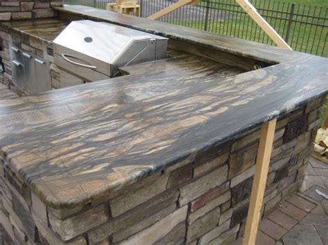 Some can be very durable and dense resisting staining and hard use, while others will stain, scratch, crack, and cleave. Outdoor Kitchen Best Countertop Material | GOQ Countertops | Omaha