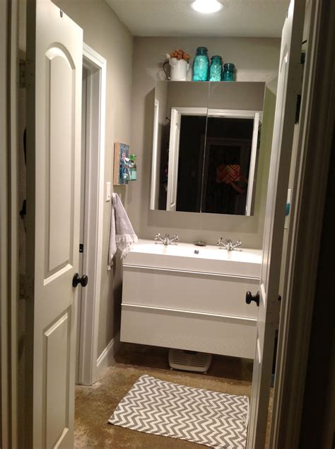With our master bathroom addition currently in progress, my girls' bathroom was the lone untouched bathroom in the house. Small master Bathroom redo: floating vanity from ikea with ...