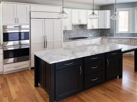 The black central island creates a perfect contrast with whites and complements the wooden beams with its wooden frame. Create a Modern Kitchen with Dark Kitchen Cabinets ...