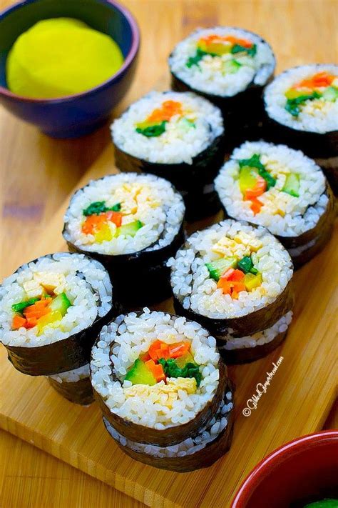 Use firm but gentle pressure to hold the ingredients in place. Vegetarian Kimbap (Korean Seaweed Rice Roll) | Recipe ...