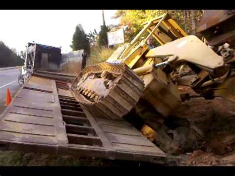 They have excellent loading capacity. cat 953 track loader unloaded in a snap - YouTube