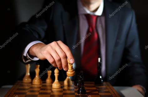 Businessman Playing Chess — Stock Photo © Sergeynivens 10829073